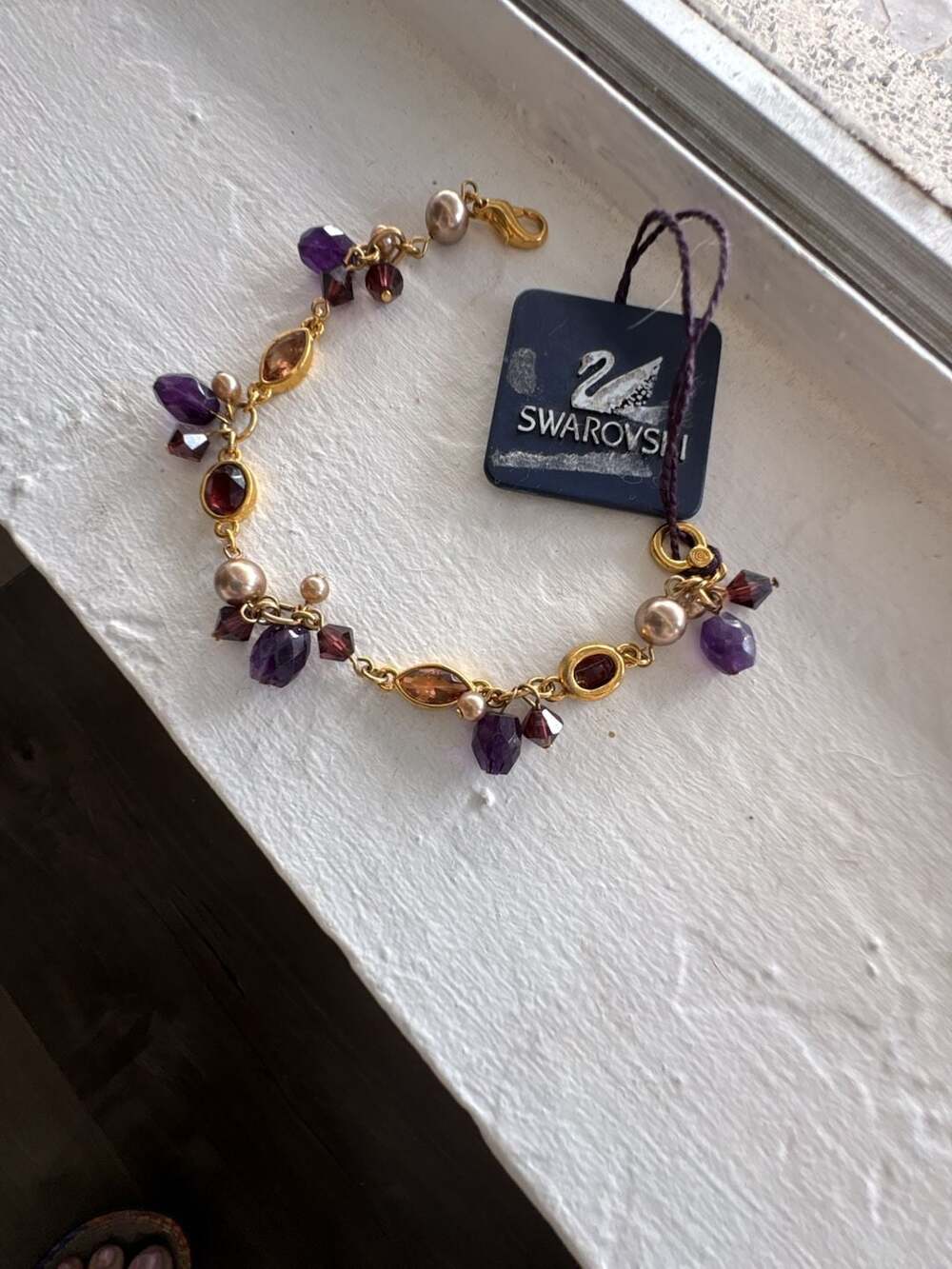 Swarovski Gold-Tone Charm Bracelet with Amethyst and Citrine-Colored Crystals an
